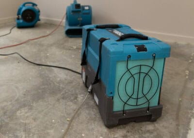 drying fans set up in bedroom