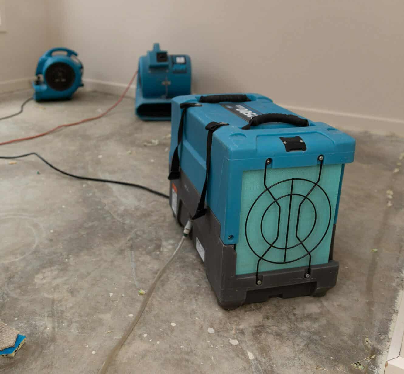 drying fans set up in bedroom