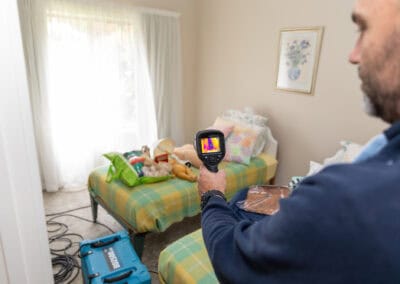 moisture detection in room, beds with all the kids toys on them, and drying fans started