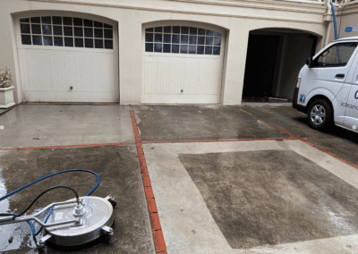 cleaning outdoor paver grey, pressure cleaning in progress