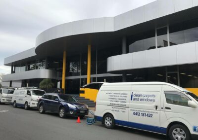 commercial cleaning job, van out front, window cleaning