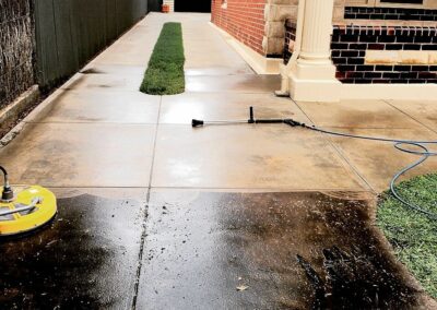 in process of cleaning outdoor pavers