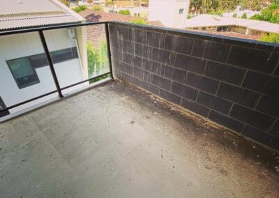 outdoor cleaning of a balcony, before, lots of dirt and debris