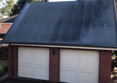 roof cleaning on a shed