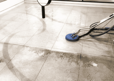 tile cleaning in a shop, in progress